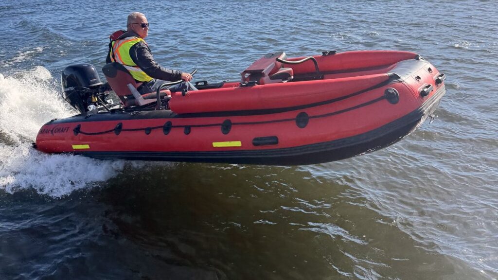 Seal Craft 470 SRJ red SAR jet raft on the water